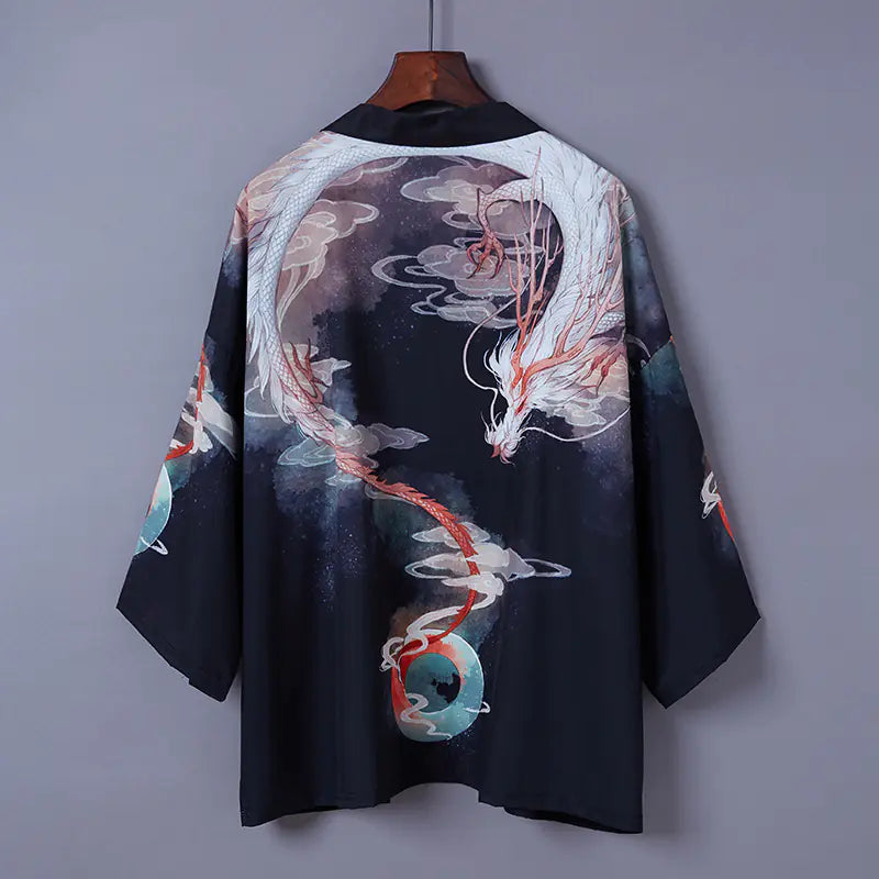 Traditional Japanese kimono with dragon design on a gray background