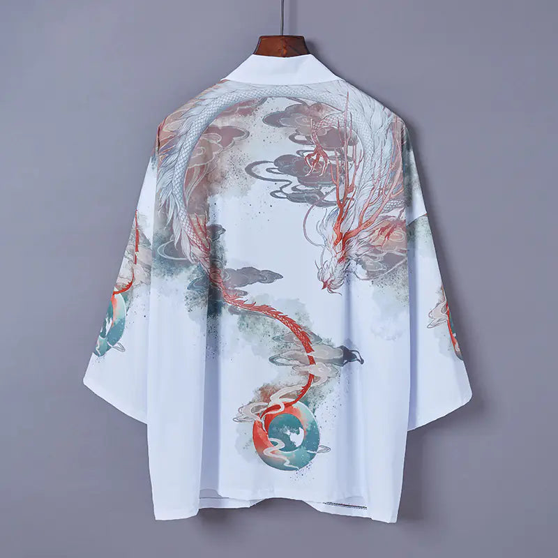 Traditional Japanese kimono with dragon design on a gray background