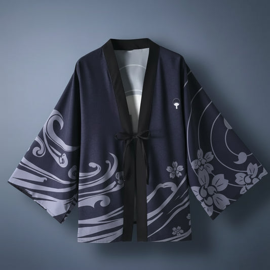 Navy blue kimono with white floral patterns on a hanger against a white background