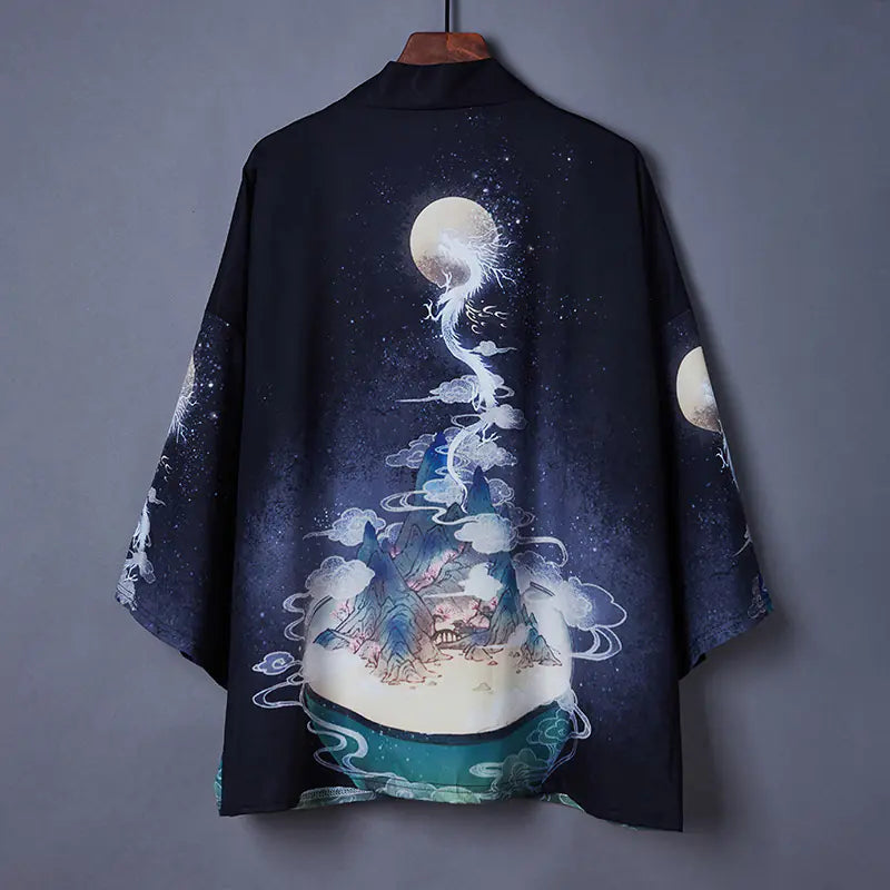 Kimono-style garment with celestial design on a gray background