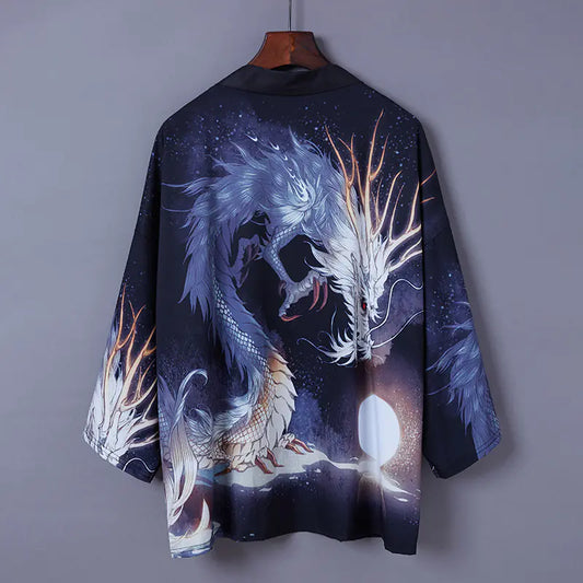 Dragon-themed garment on a hanger against a gray background
