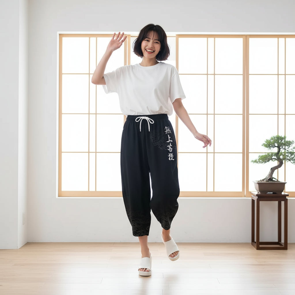 Black pants with white text and patterns on a white background