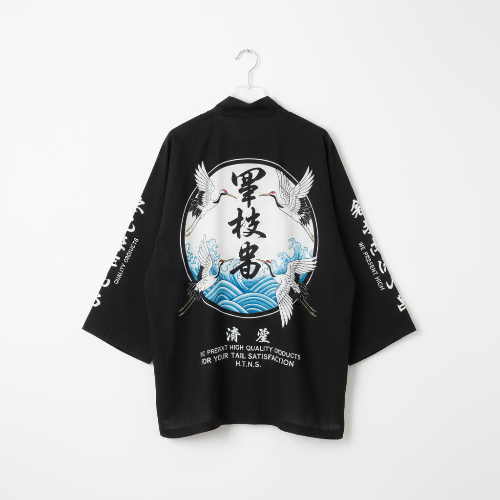 Black kimono-style garment with Japanese text and crane designs on a white background