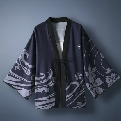 Navy blue kimono with white floral patterns on a hanger against a white background