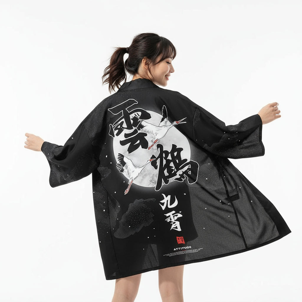 Woman wearing a black kimono with white designs and text on a white background