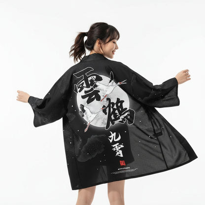 Woman wearing a black kimono with white designs and text on a white background
